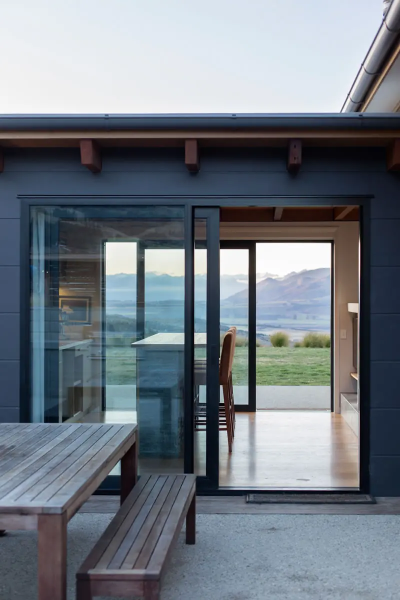 Large glazed sliding doors opening out to the view