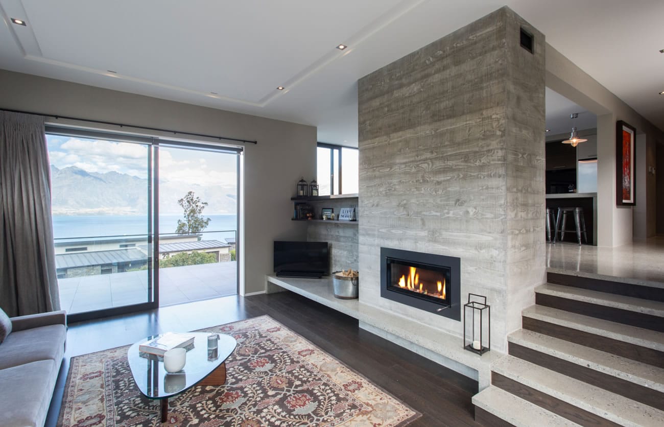 Modern living room with balcony overlooking Lake Wakatipu