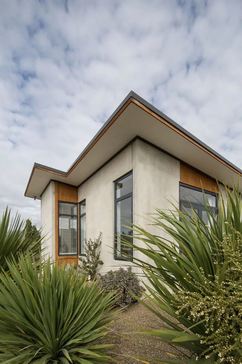 Exterior view of concrete home in Wanaka